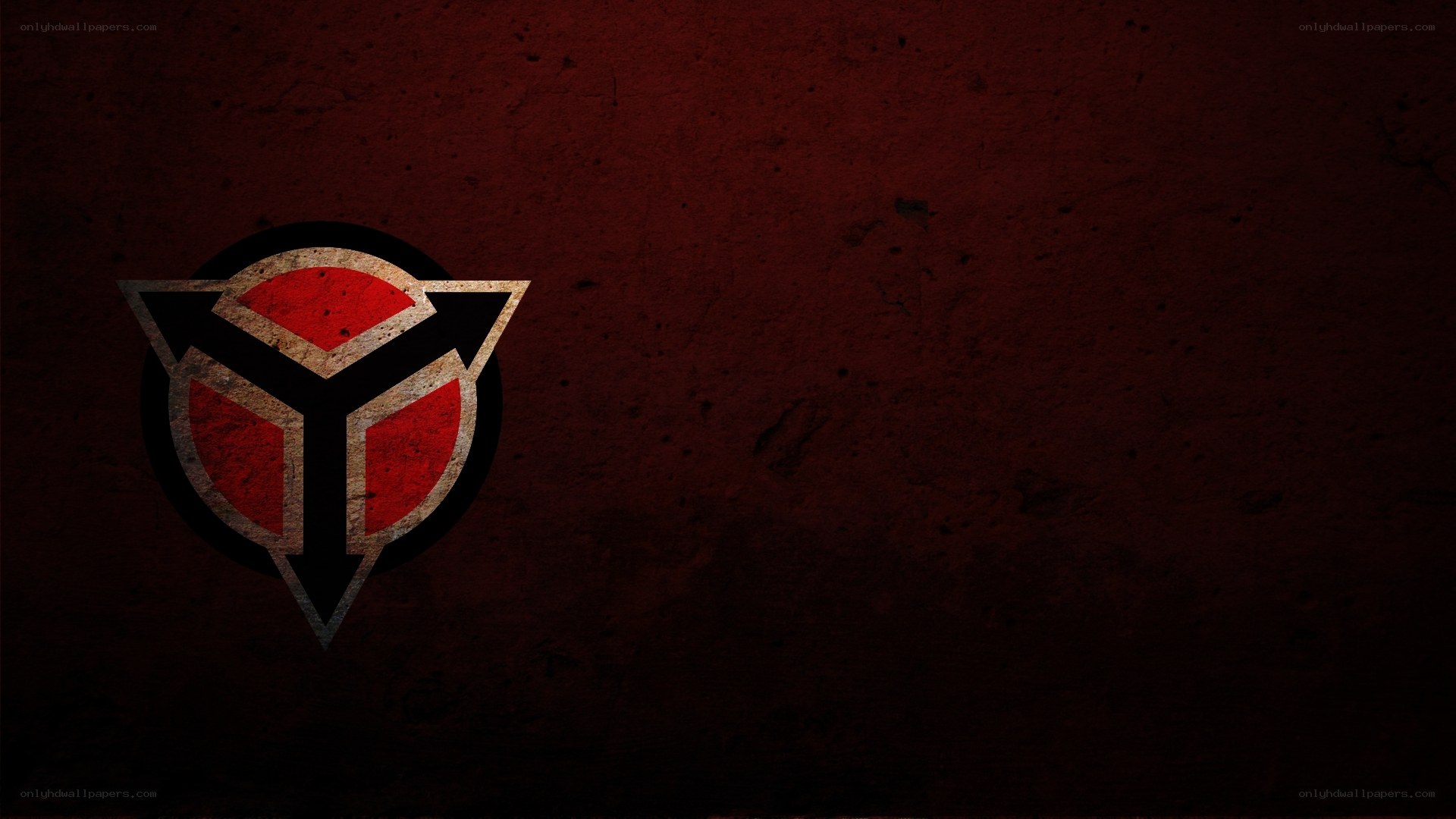 red emblem on dark background