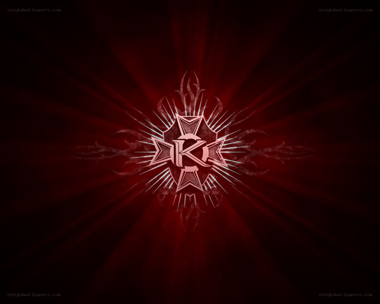 red emblem with glowing rays