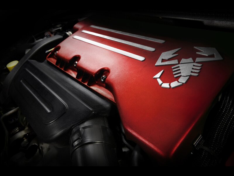 red engine cover with scorpion emblem
