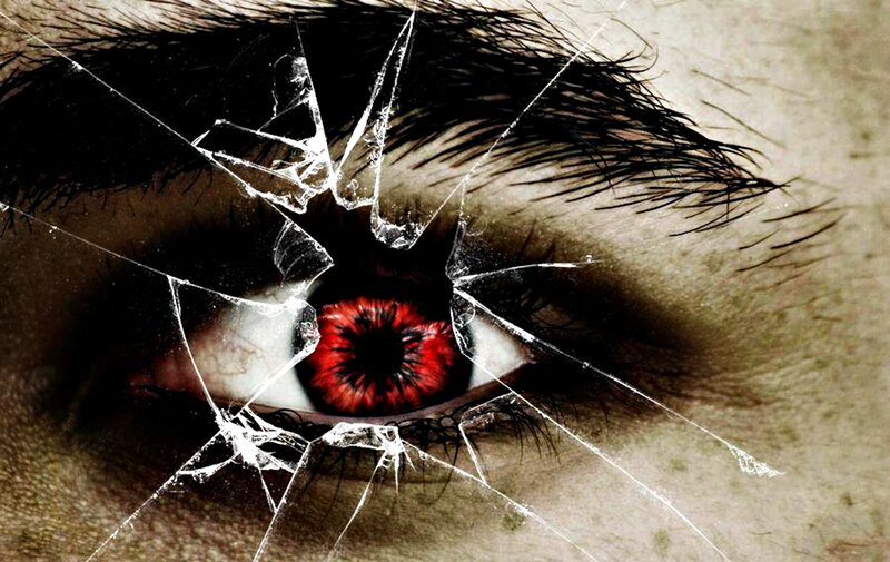 Red Eye Behind Cracked Glass
