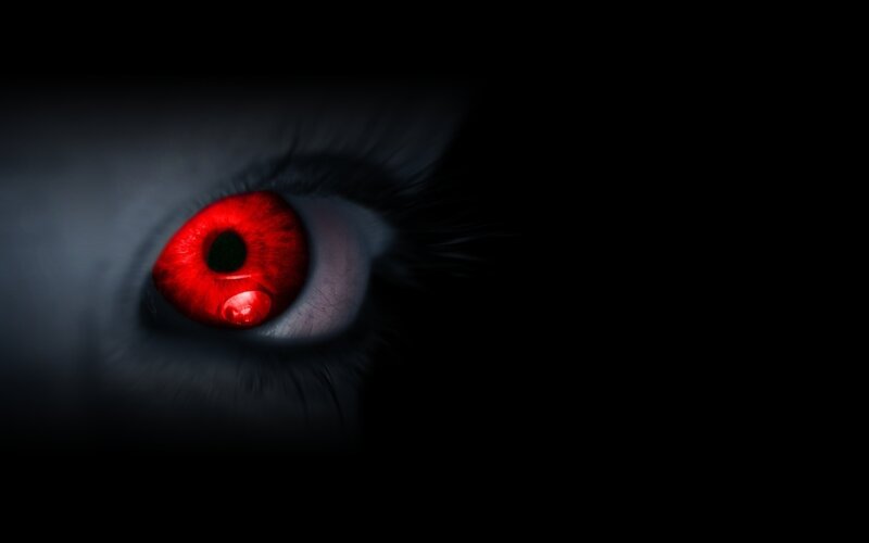 red eye in darkness