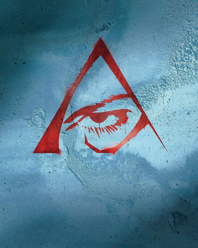 Red eye symbol on blue wall