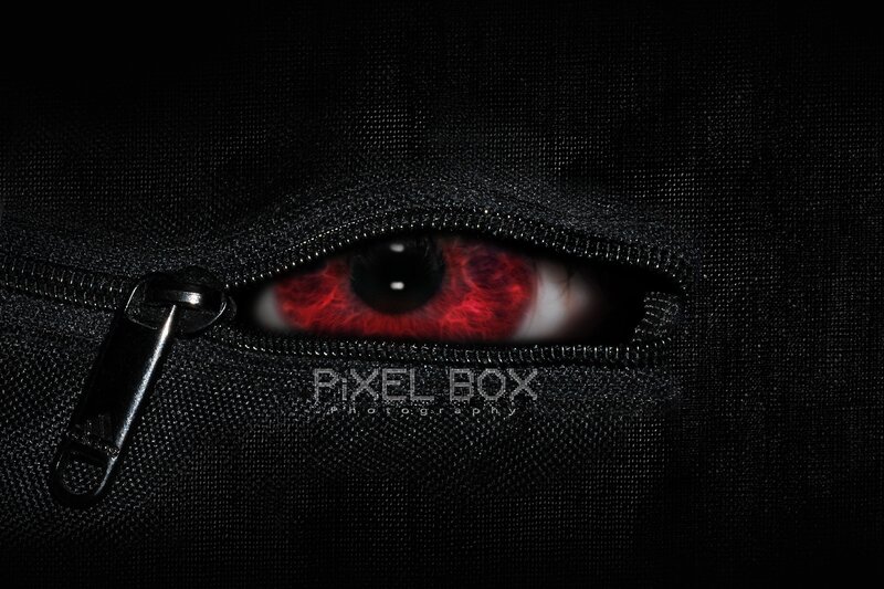 Red Eye Through Zipper