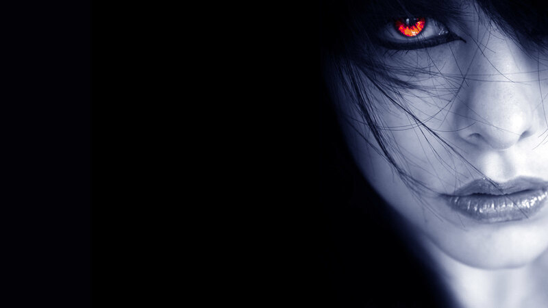 red-eyed woman in darkness