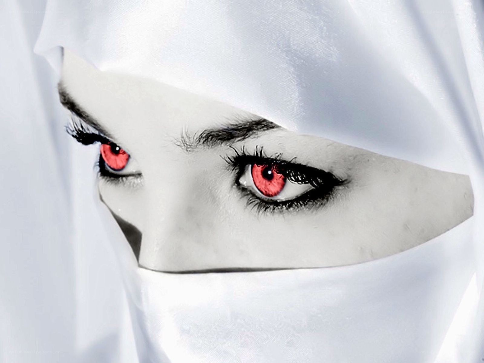 red eyes under white veil