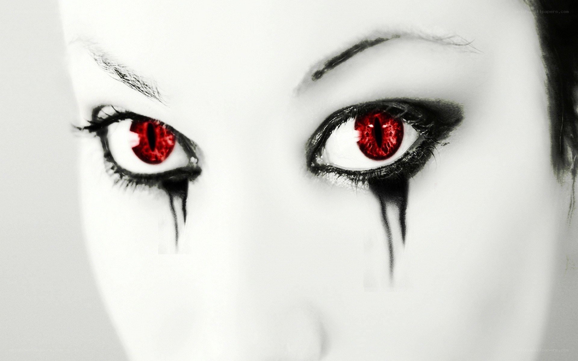 red eyes with black tears
