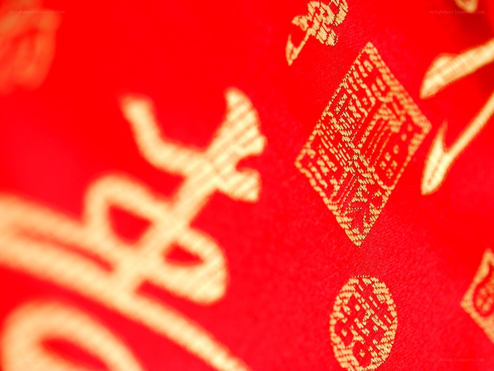 red fabric with gold chinese characters