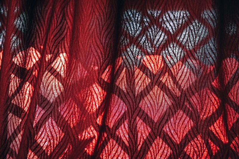Red fabric with leaf pattern