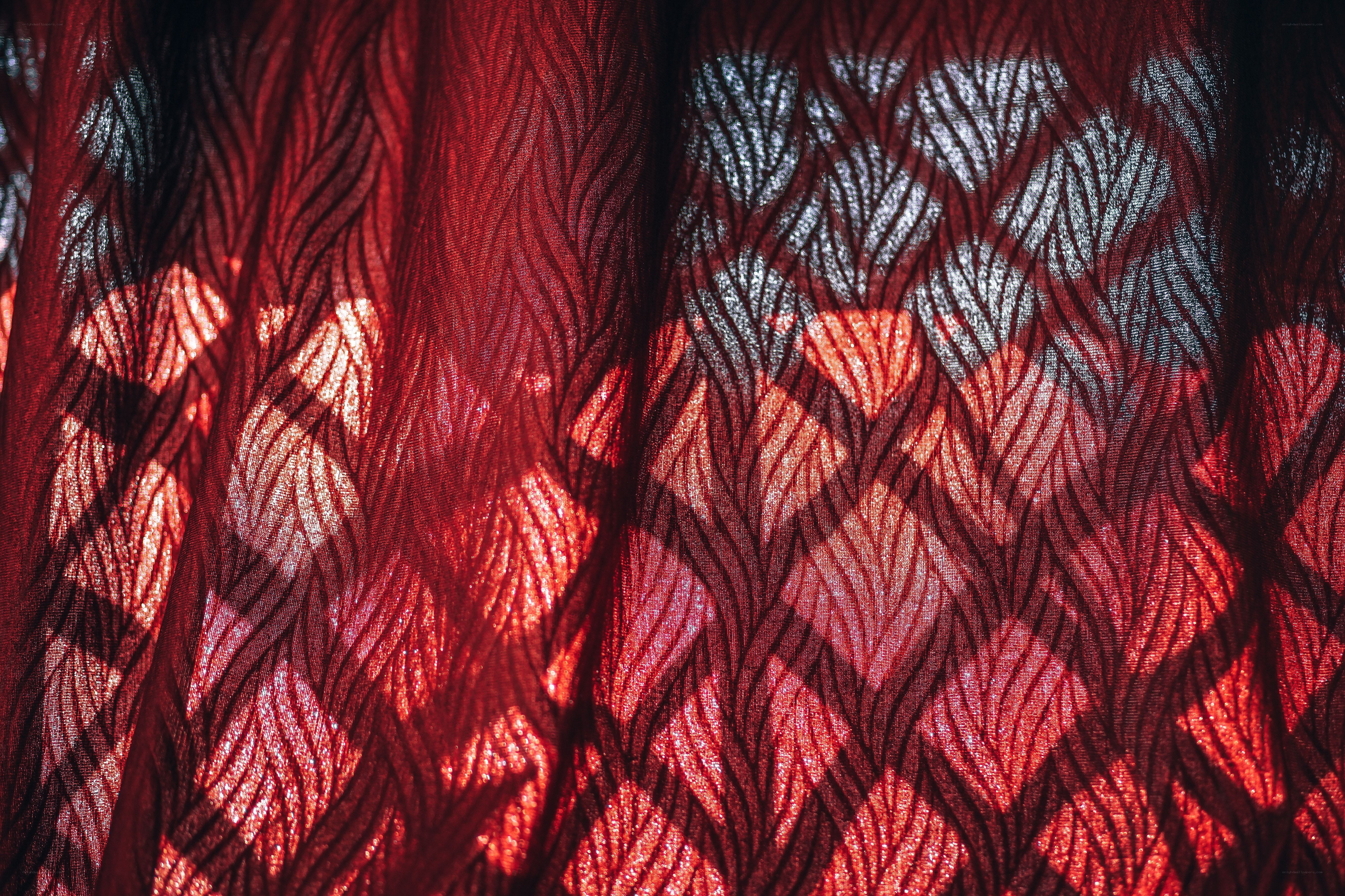 Red fabric with leaf pattern
