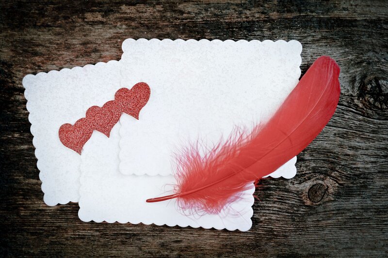 Red Feather on Cards
