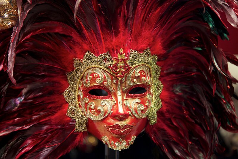 Red feathered masquerade mask
