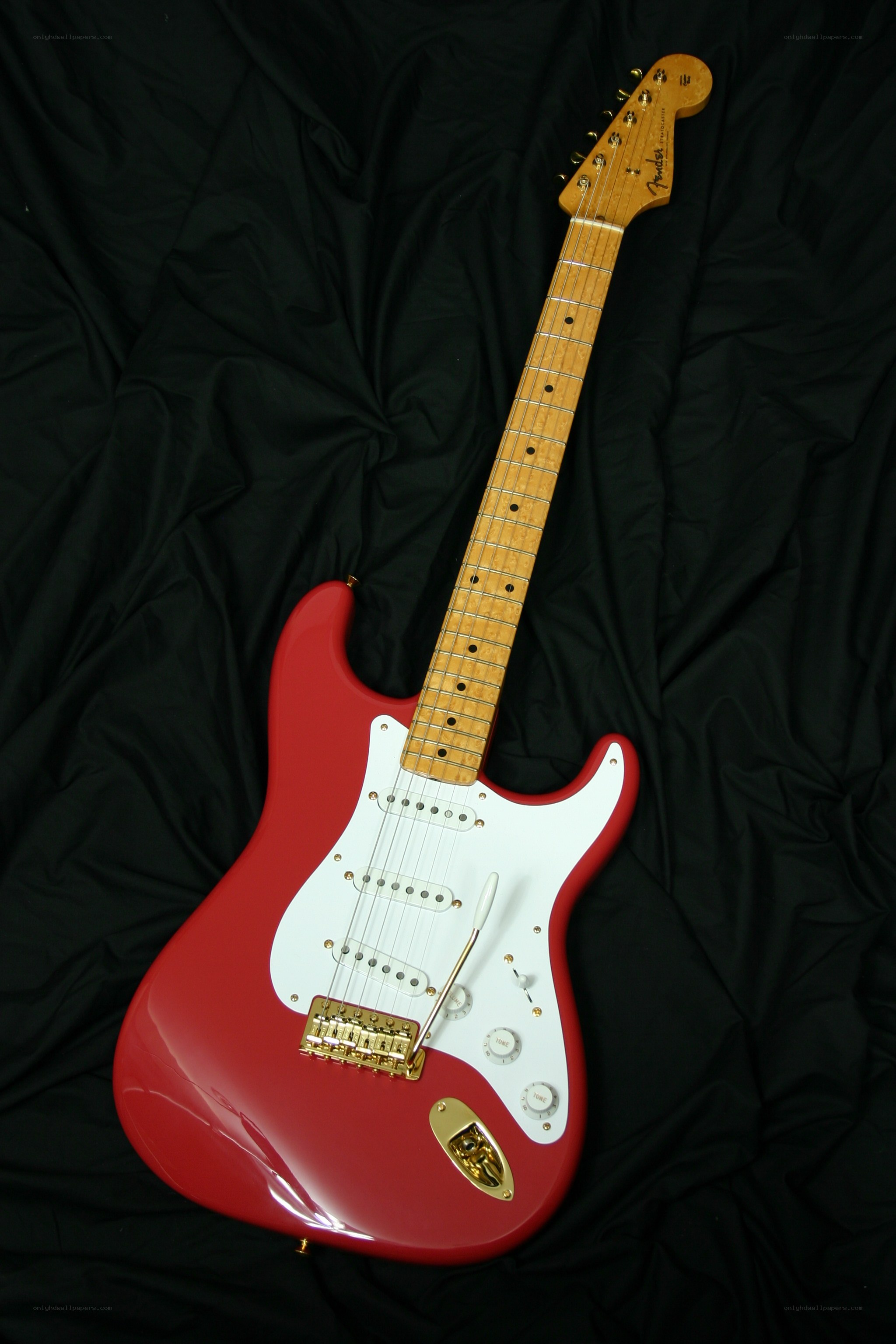 red fender stratocaster guitar