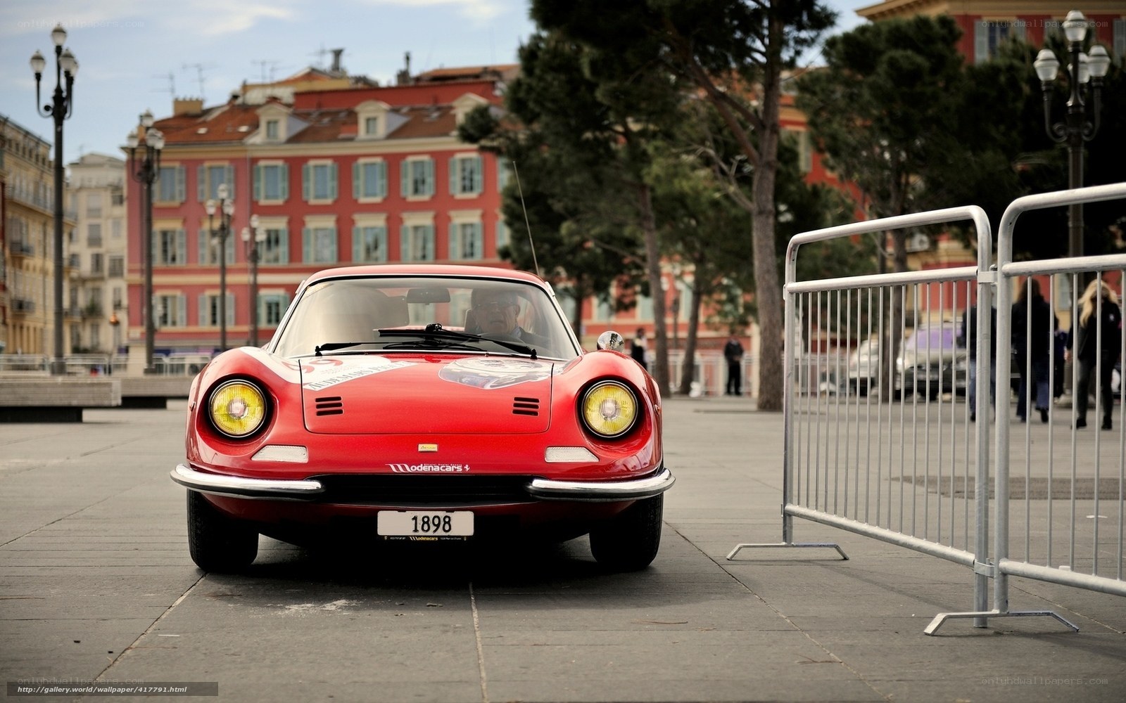 Red Ferrari 1969 in city