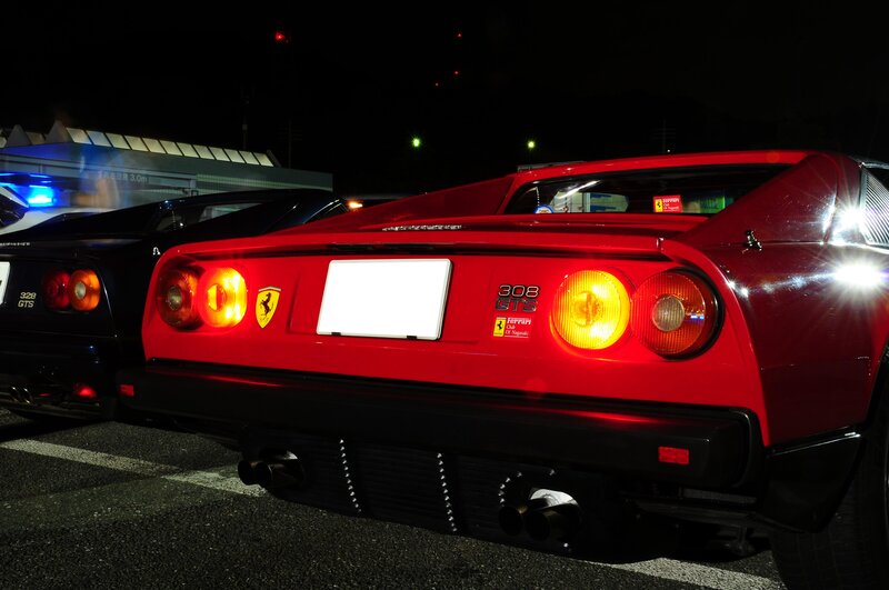 Red Ferrari 308 GTS at night
