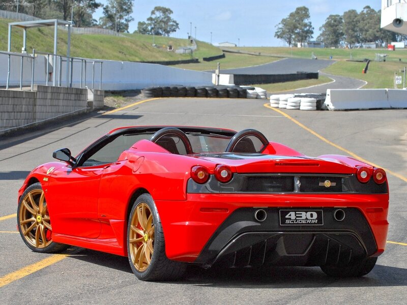 Red Ferrari 430 Scuderia on track
