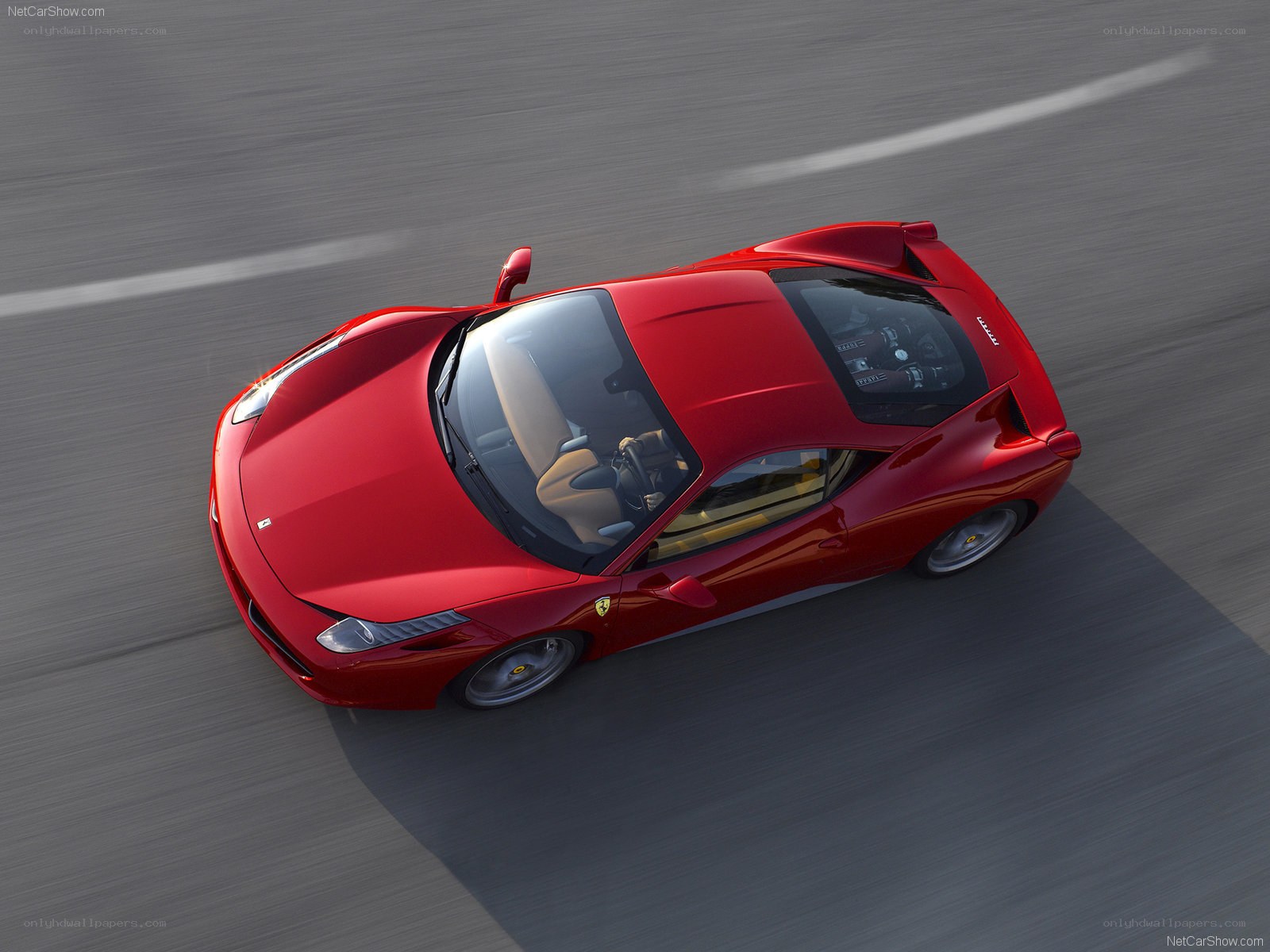 Red Ferrari 458 driving on track