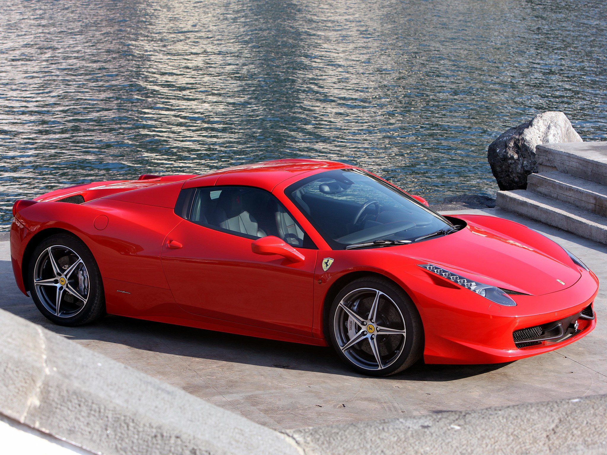 Red Ferrari 458 Italia by water