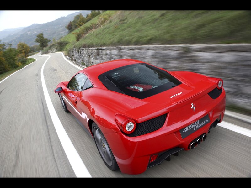 Red Ferrari 458 Italia on road