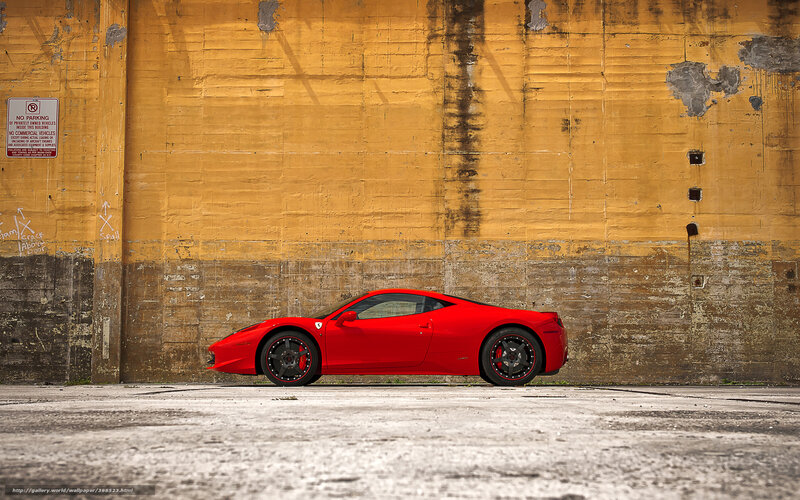 Red Ferrari against yellow wall