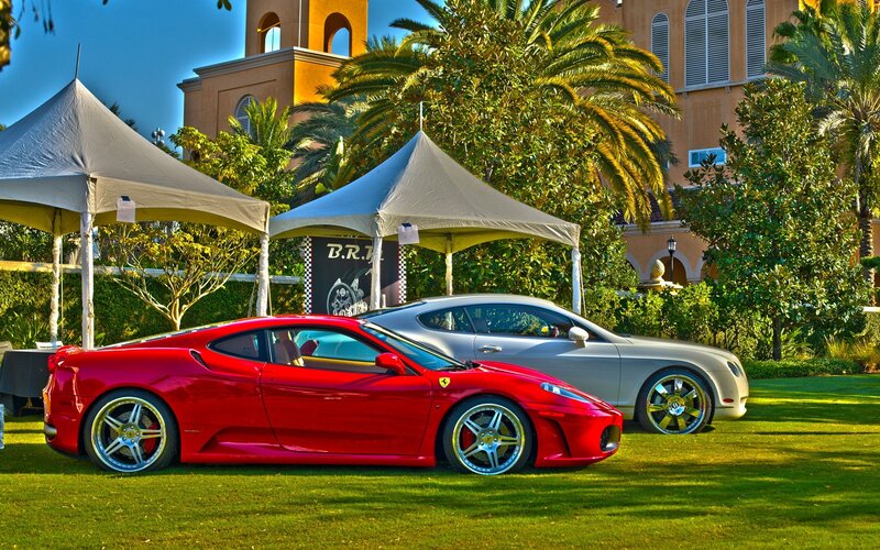 Red Ferrari and Silver Bentley