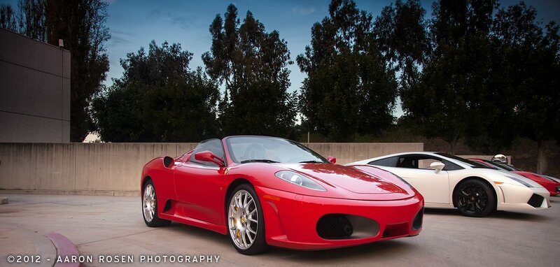 Red Ferrari and white Lamborghini