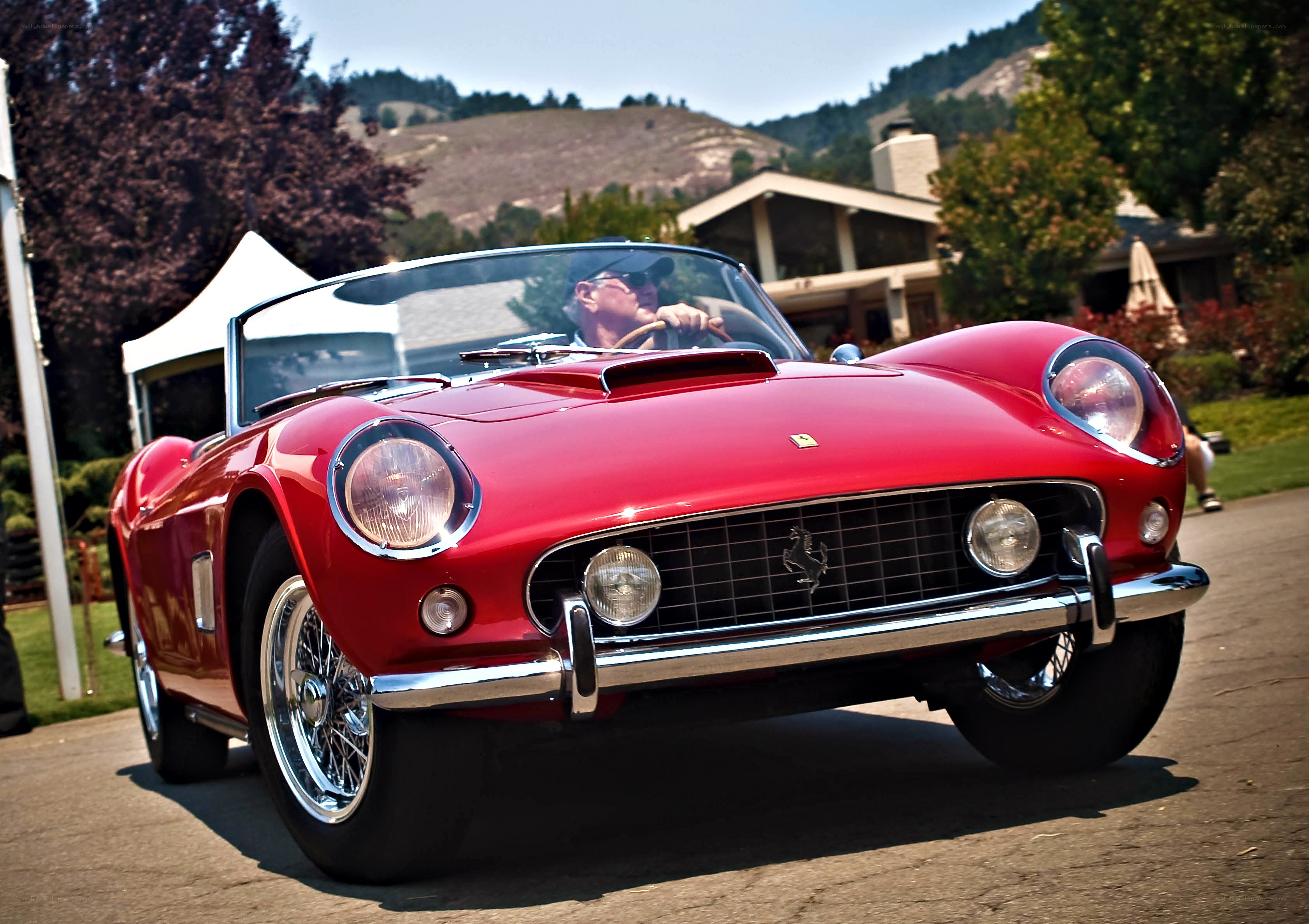 Red Ferrari at a car show