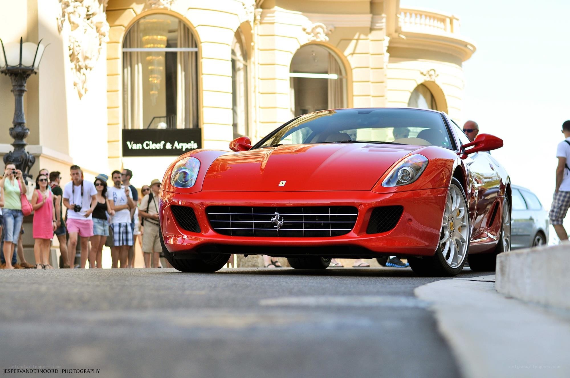 Red Ferrari at a public event