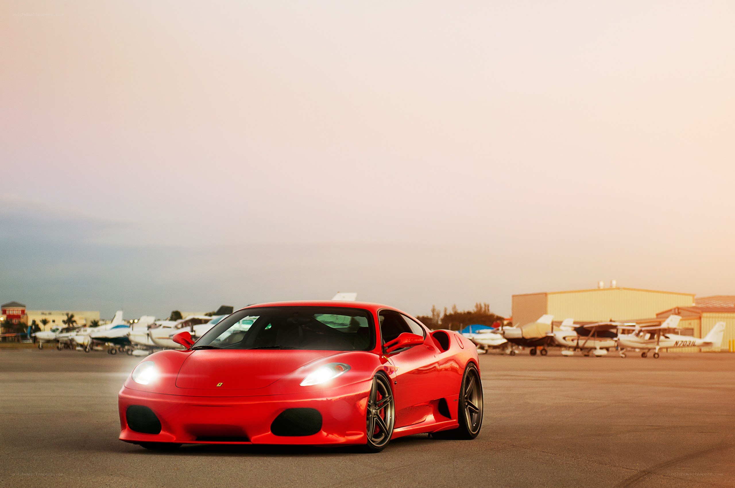 Red Ferrari at airfield
