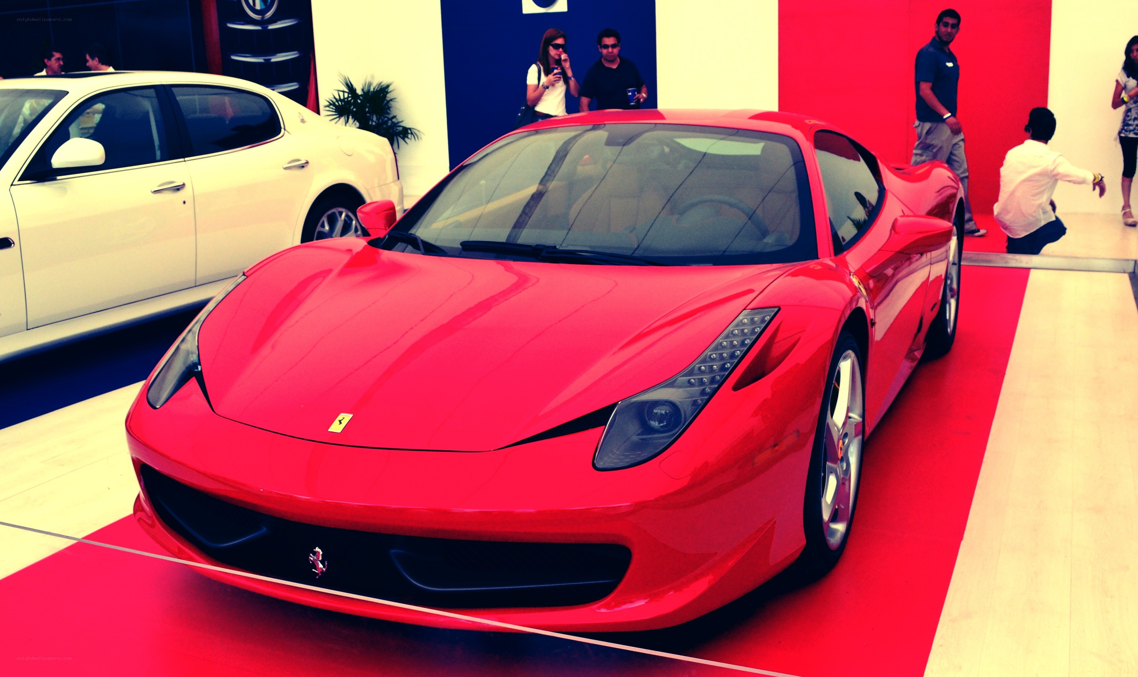 Red Ferrari at auto show