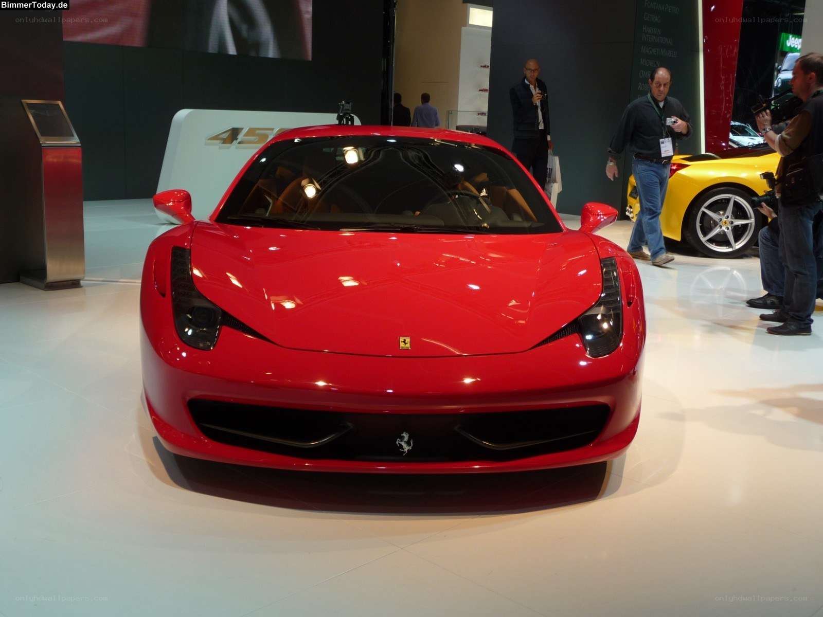 Red Ferrari at auto show