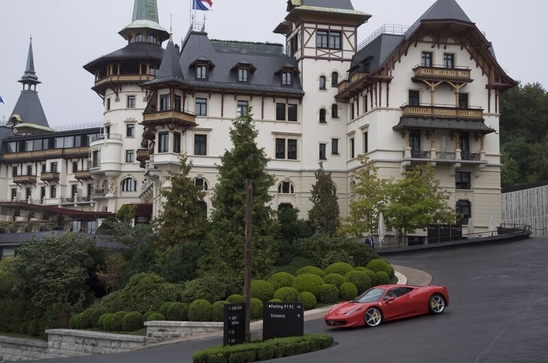 Red Ferrari at luxury hotel