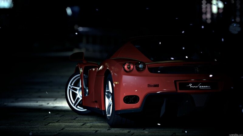 red ferrari at night