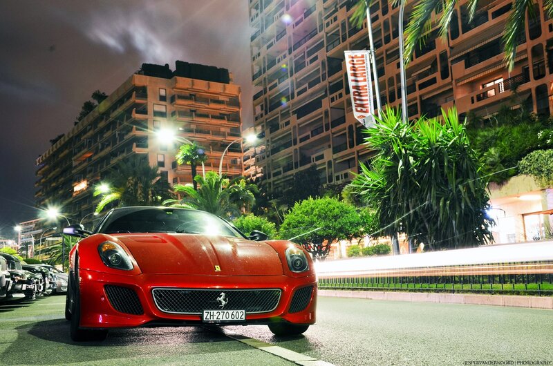 Red Ferrari at night in Monaco