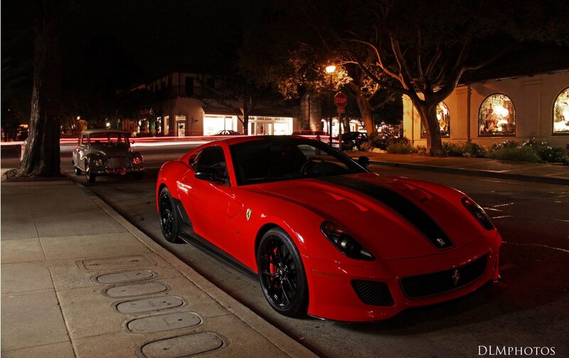 Red Ferrari at night on a street