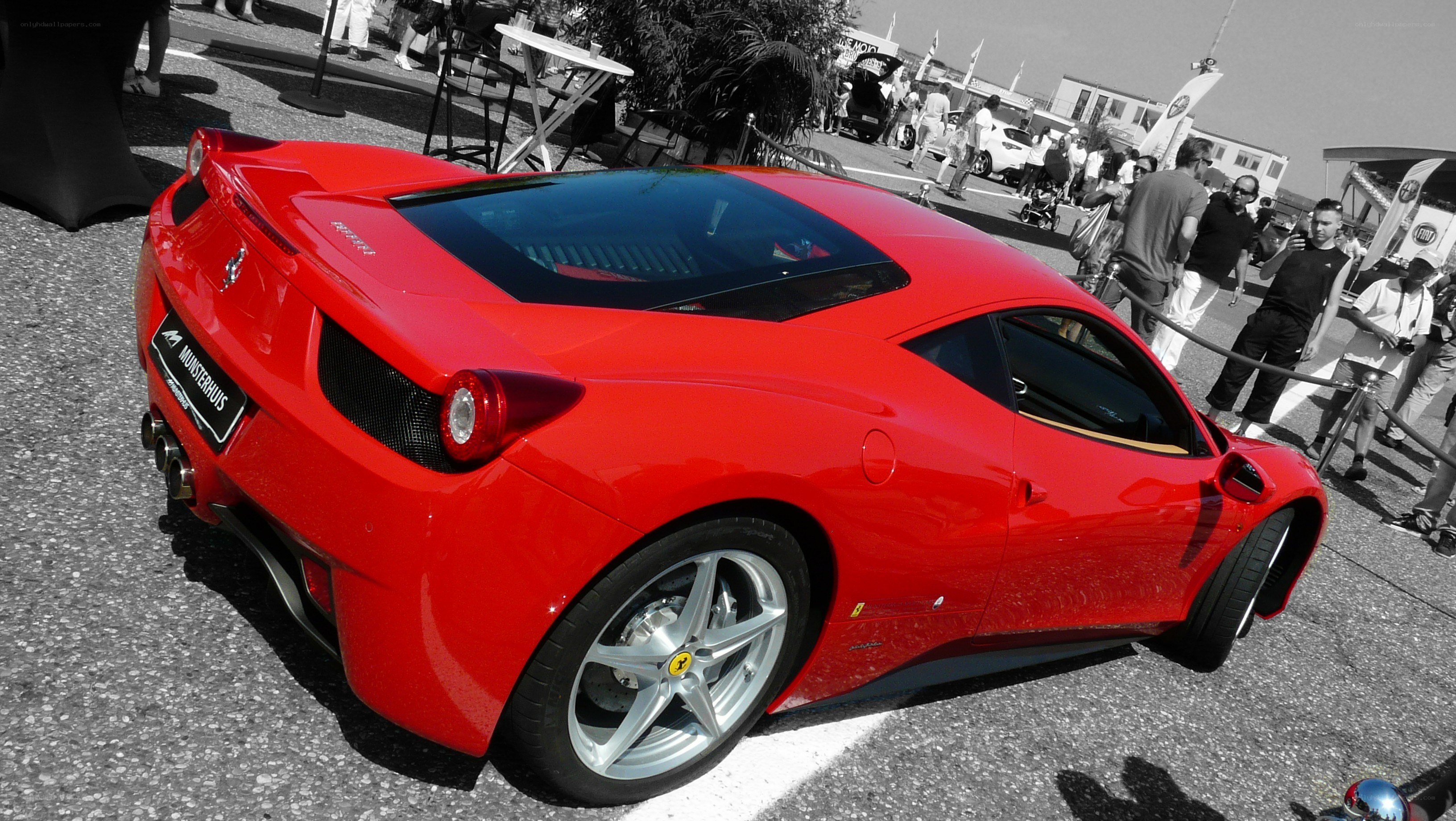 Red Ferrari at outdoor event