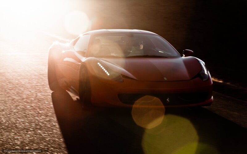 Red Ferrari at sunset