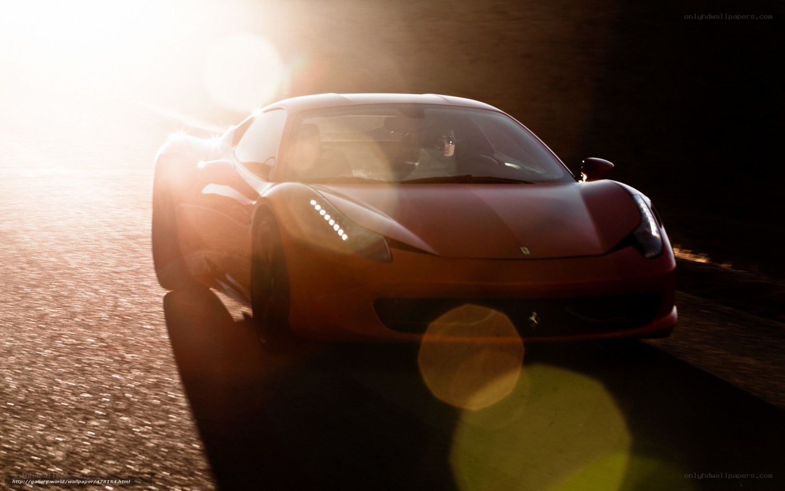 Red Ferrari at sunset