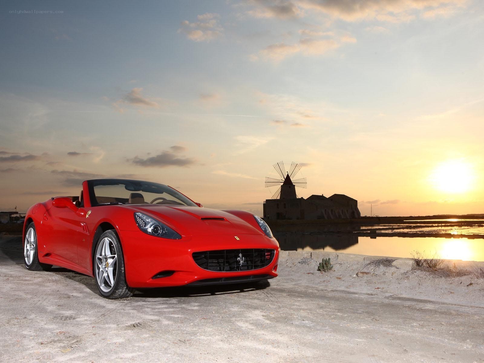 Red Ferrari at sunset