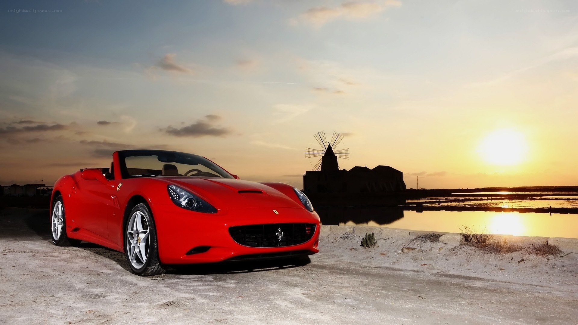 Red Ferrari at sunset