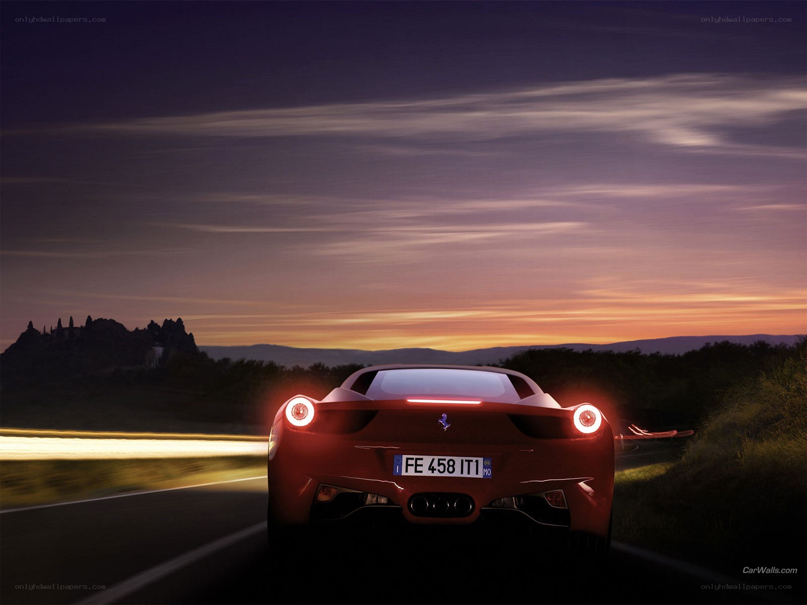 Red Ferrari at sunset