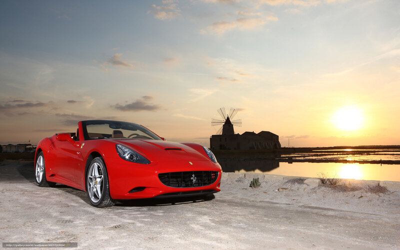 Red Ferrari at sunset