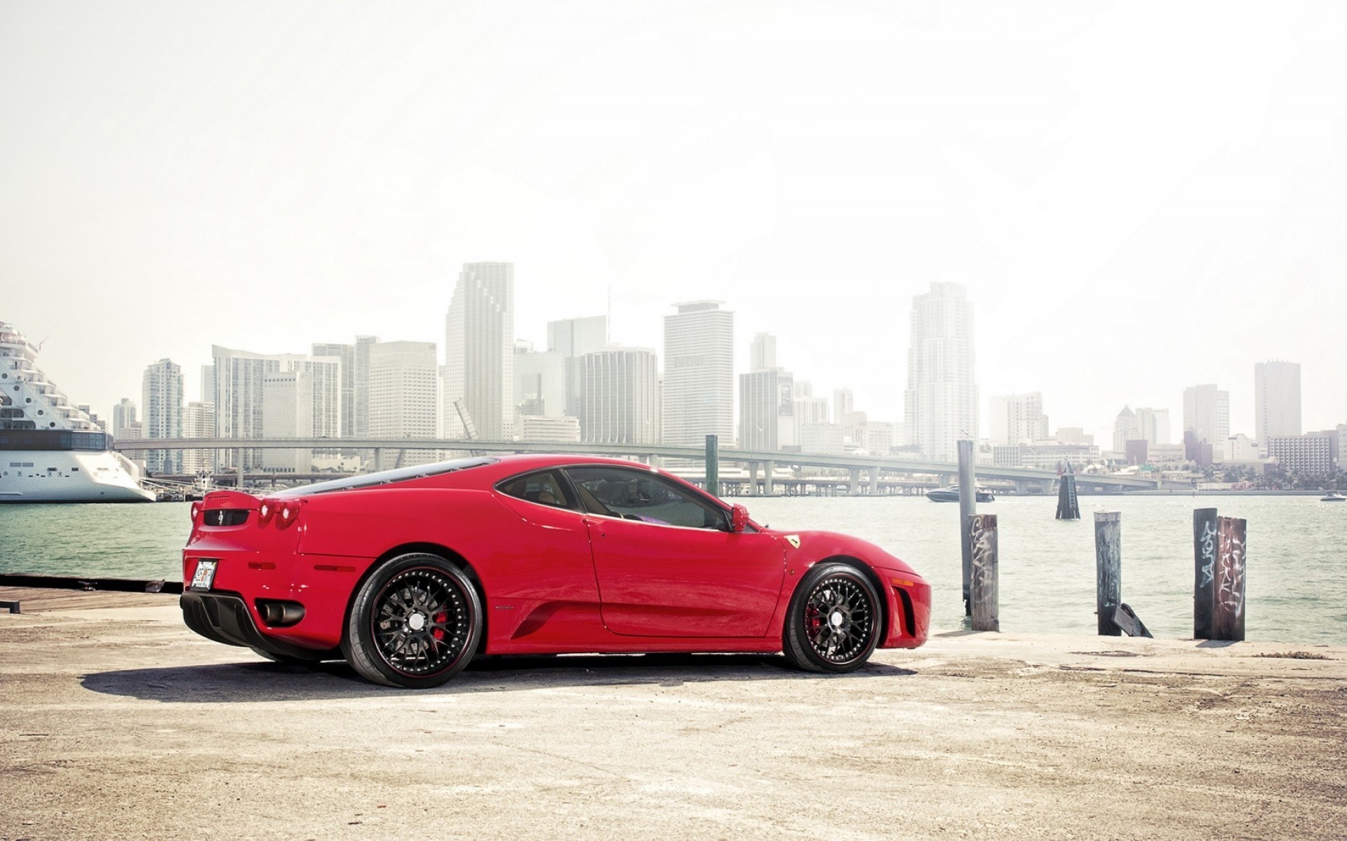Red Ferrari at waterfront