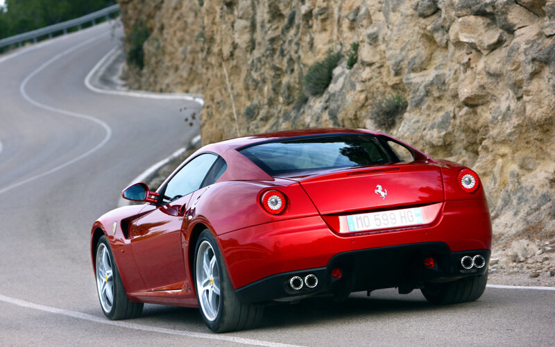 Red Ferrari Car — Dynamic, Afternoon, Photograph, Road, Rock Wall