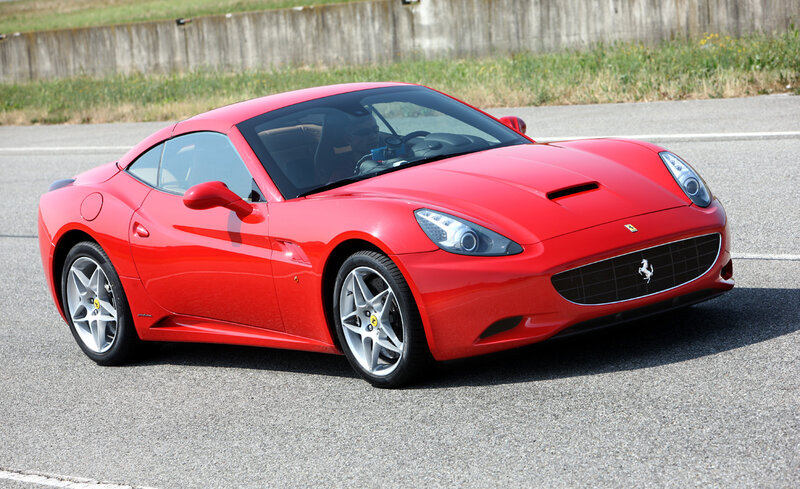 Red Ferrari Car — Dynamic, Afternoon, Photograph, Road