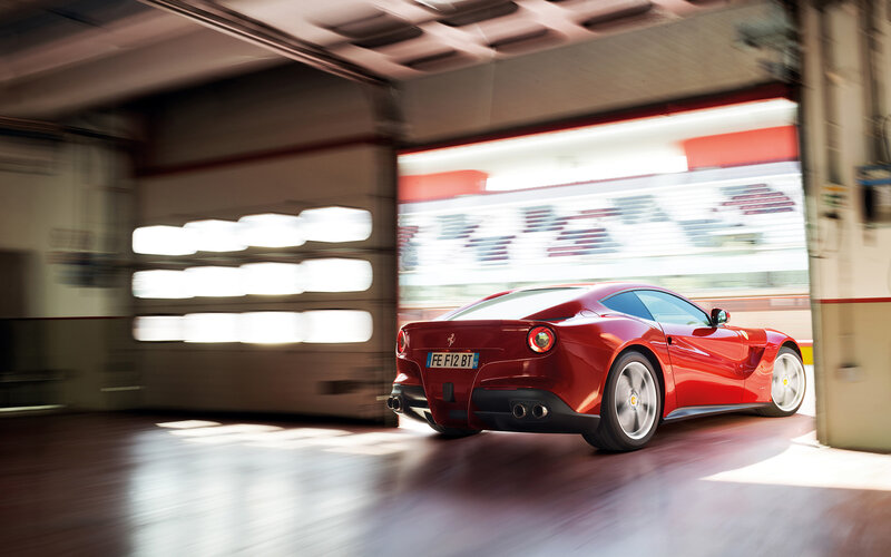 Red Ferrari Car — Dynamic, Photograph, Garage