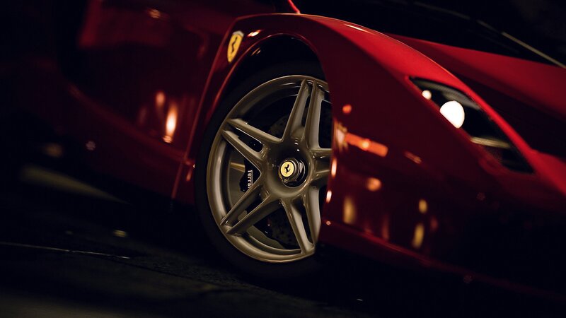 Red Ferrari Car Wheel — Dramatic, Night