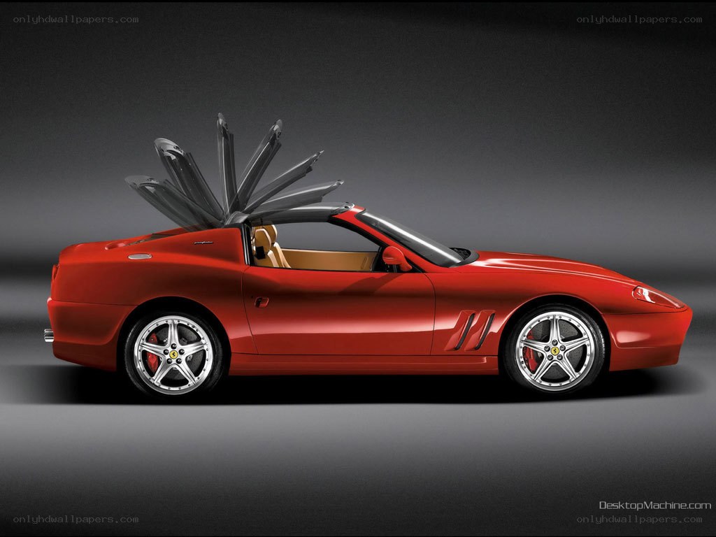 Red Ferrari convertible car