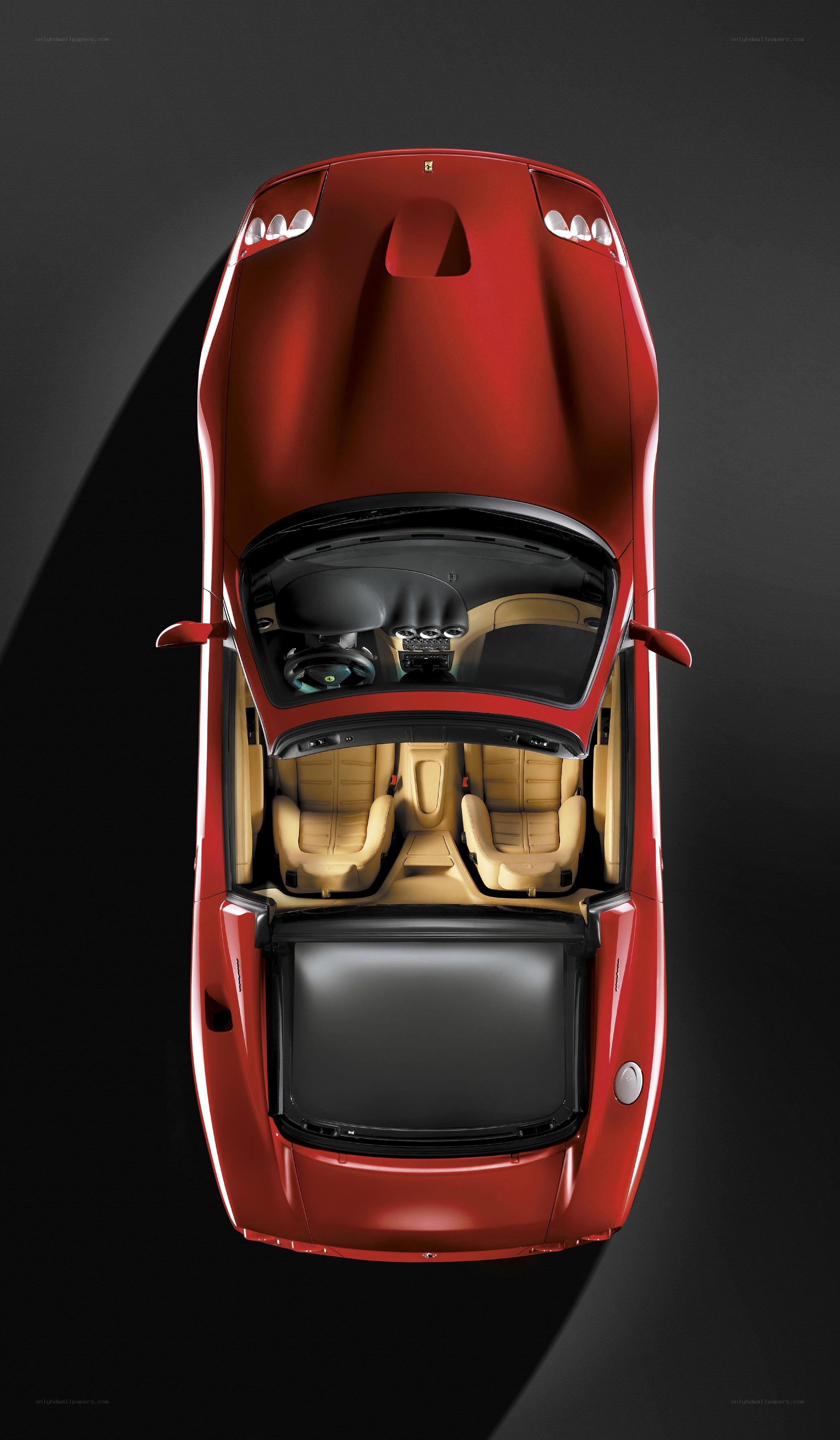 Red Ferrari convertible from above