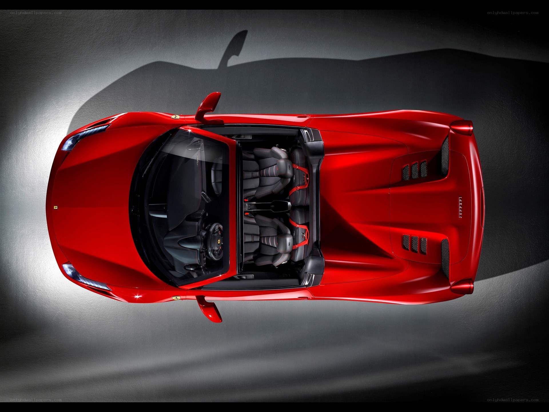 Red Ferrari convertible from above