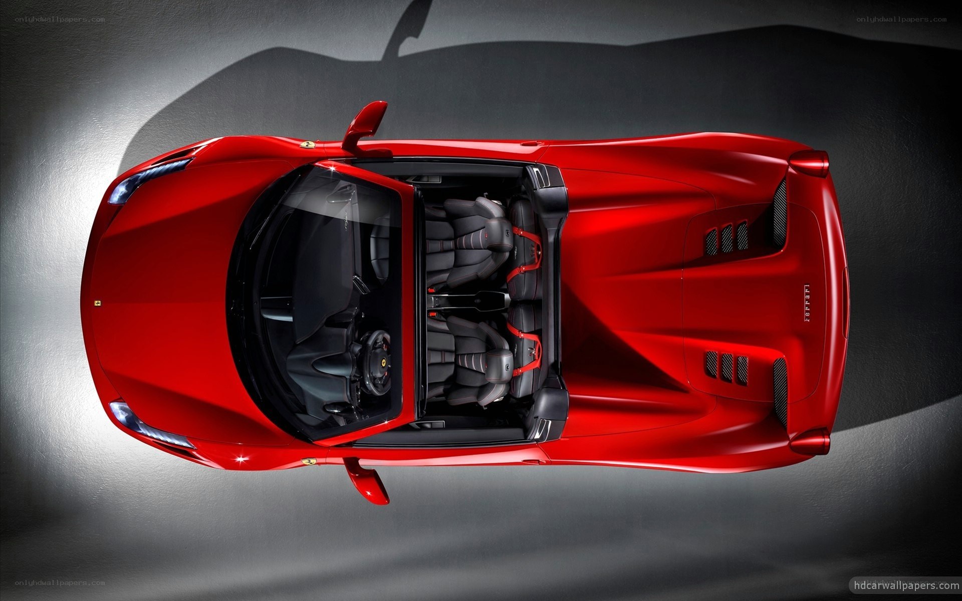 Red Ferrari convertible from above